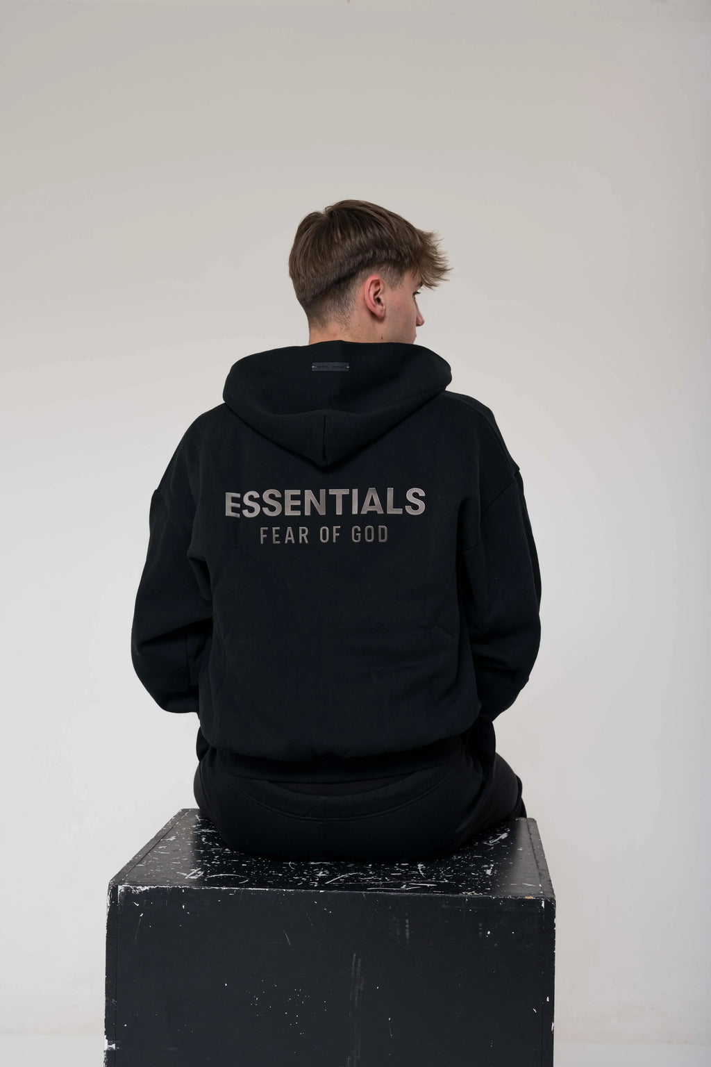 Fear of God Essentials Classic Fleece Zip-Up Hoodie Glossy Jet Black outfit