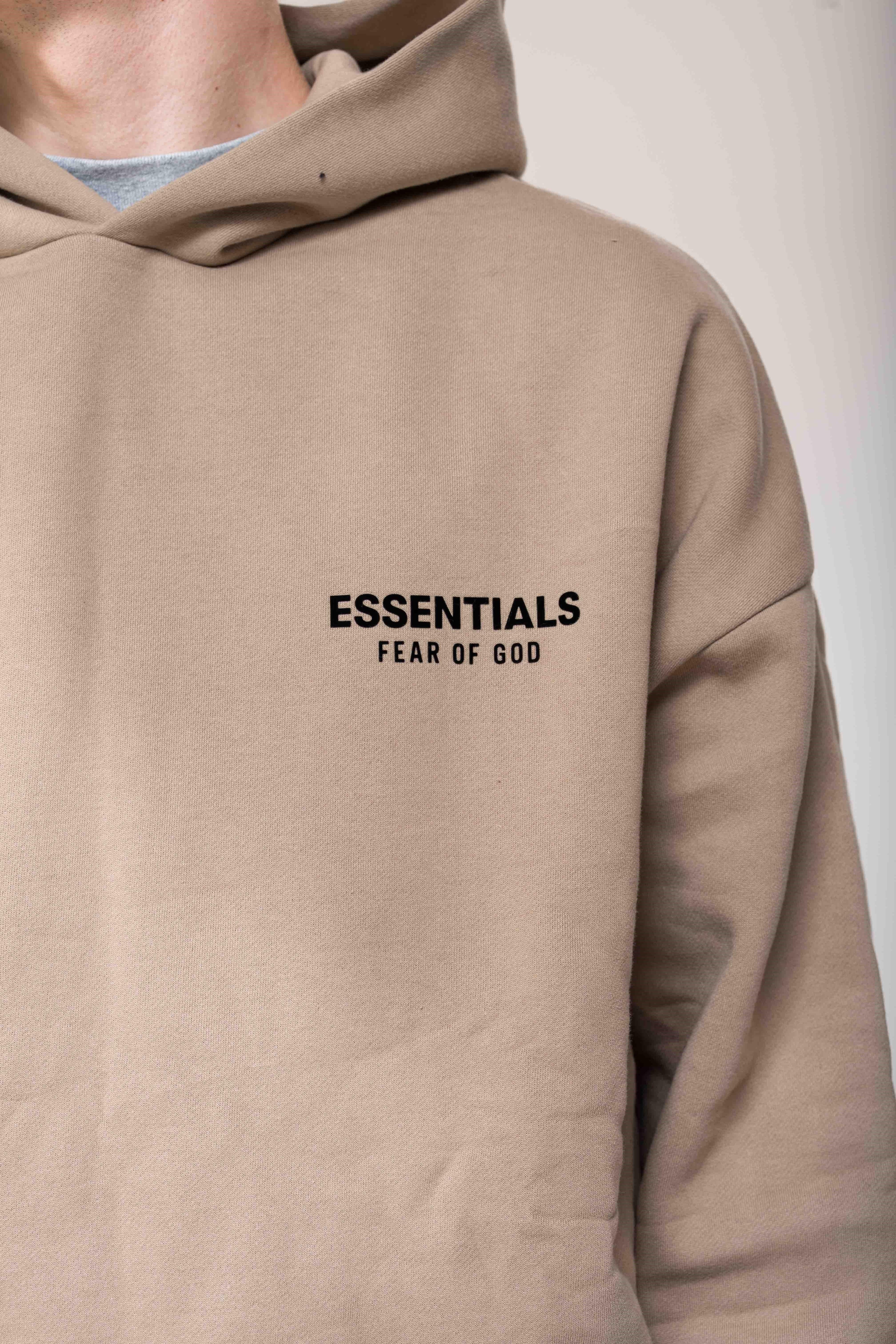 Fear of God Essentials Fleece Desert Sand Hoodie logo detail