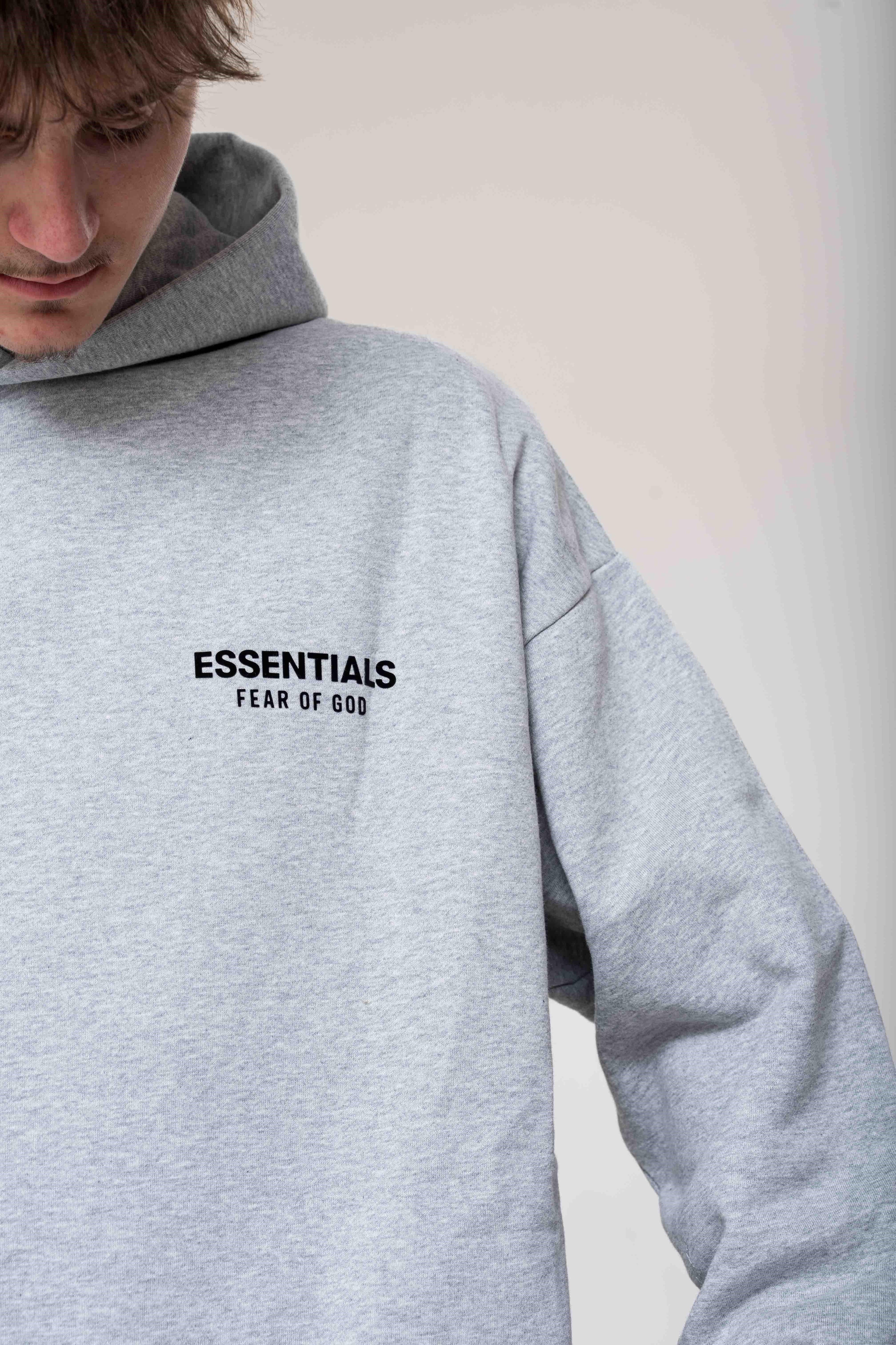 Fear of God Essentials Fleece Hoodie Light Heather Gray logo detail