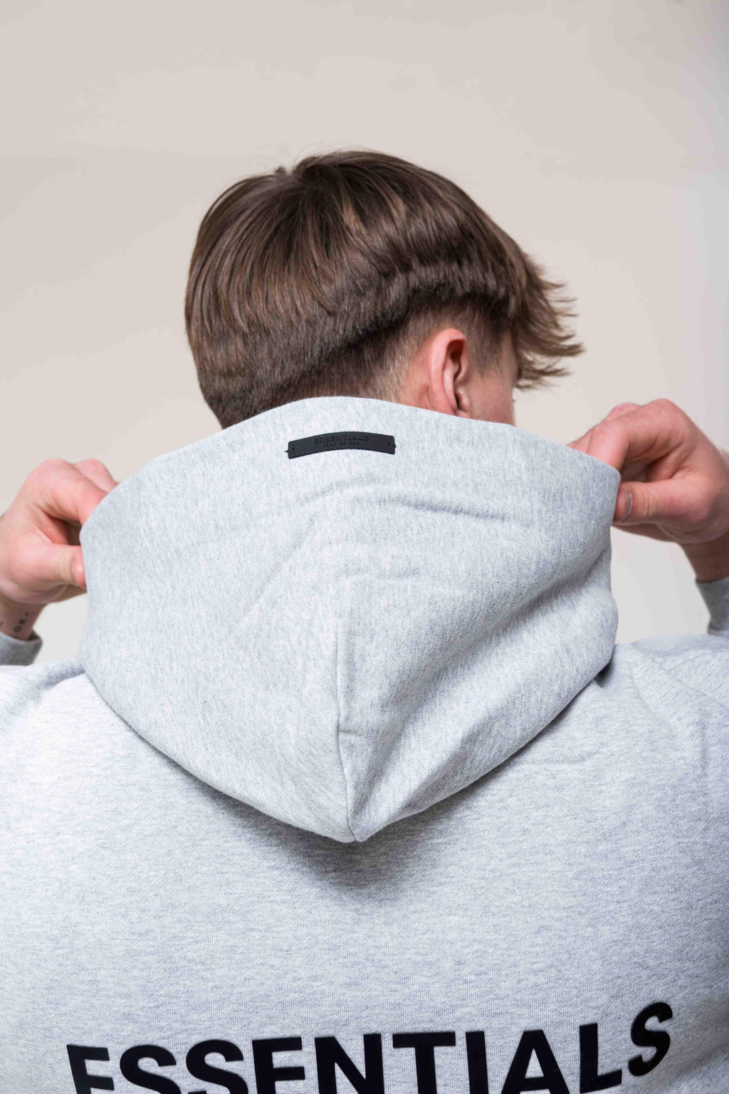 Fear of God Essentials Fleece Light Heather Gray Hoodie back detail