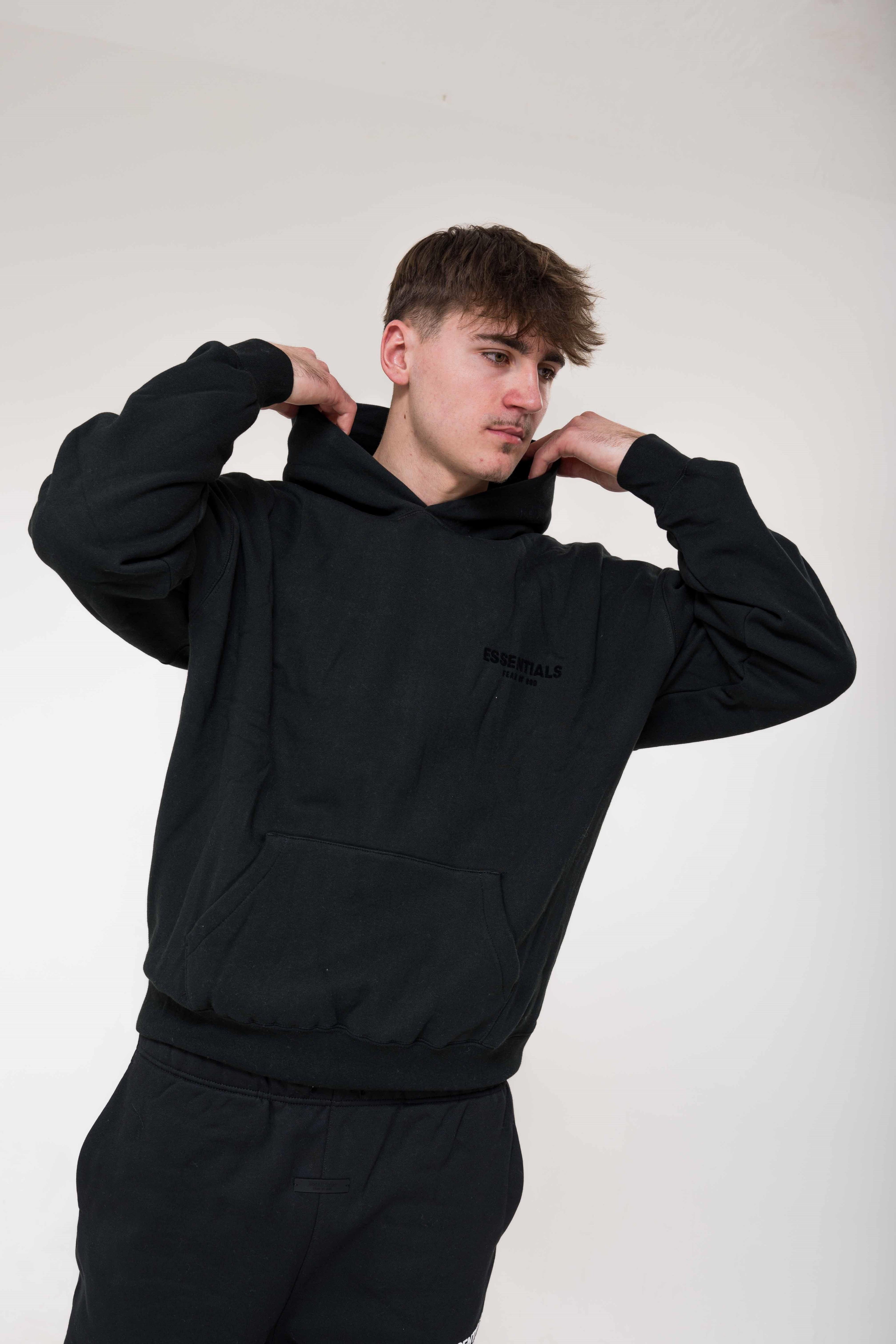 Fear of God Essentials Stretch Limo Black Hoodie outfit
