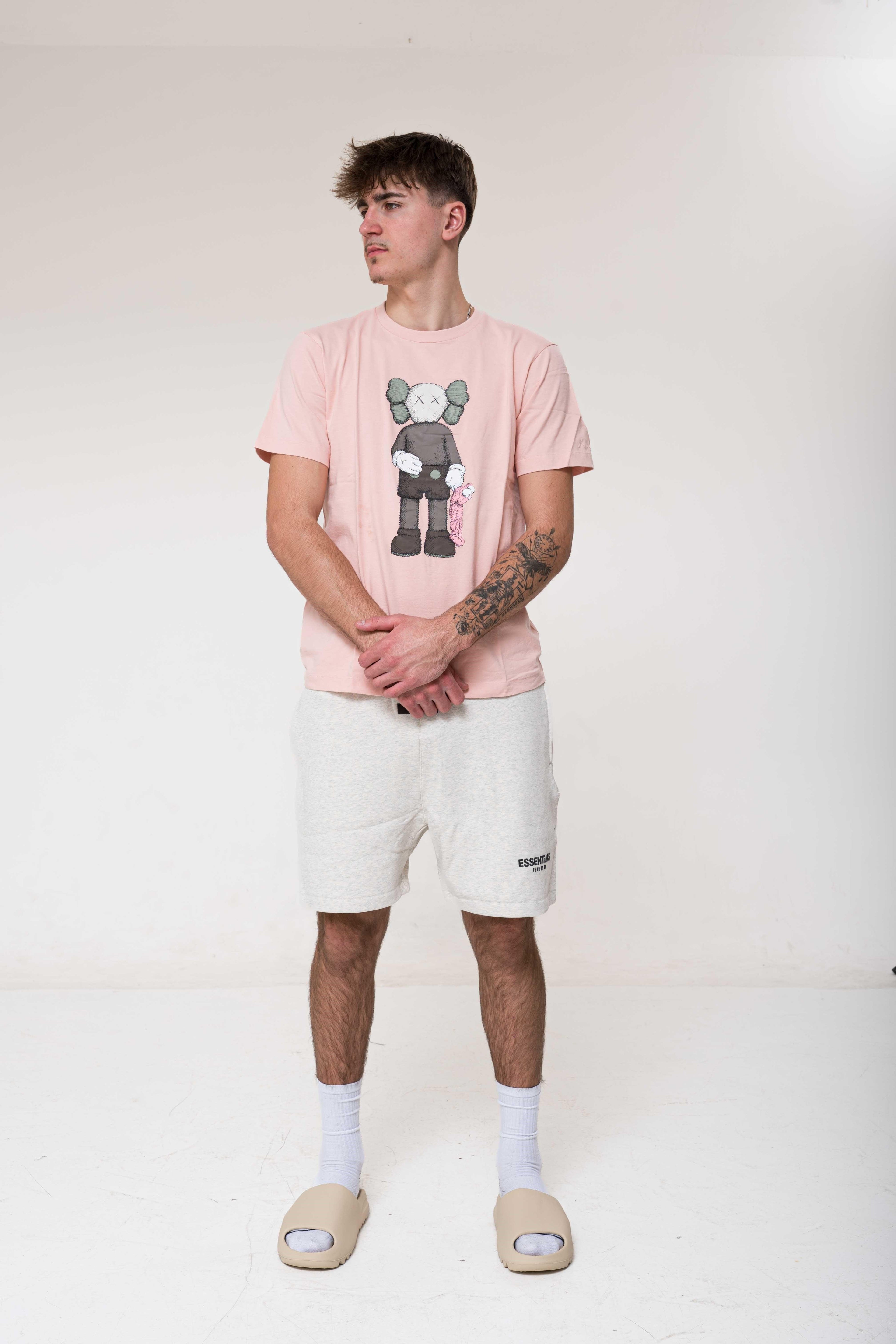 KAWS x Uniqlo Companion Tee Pink front view