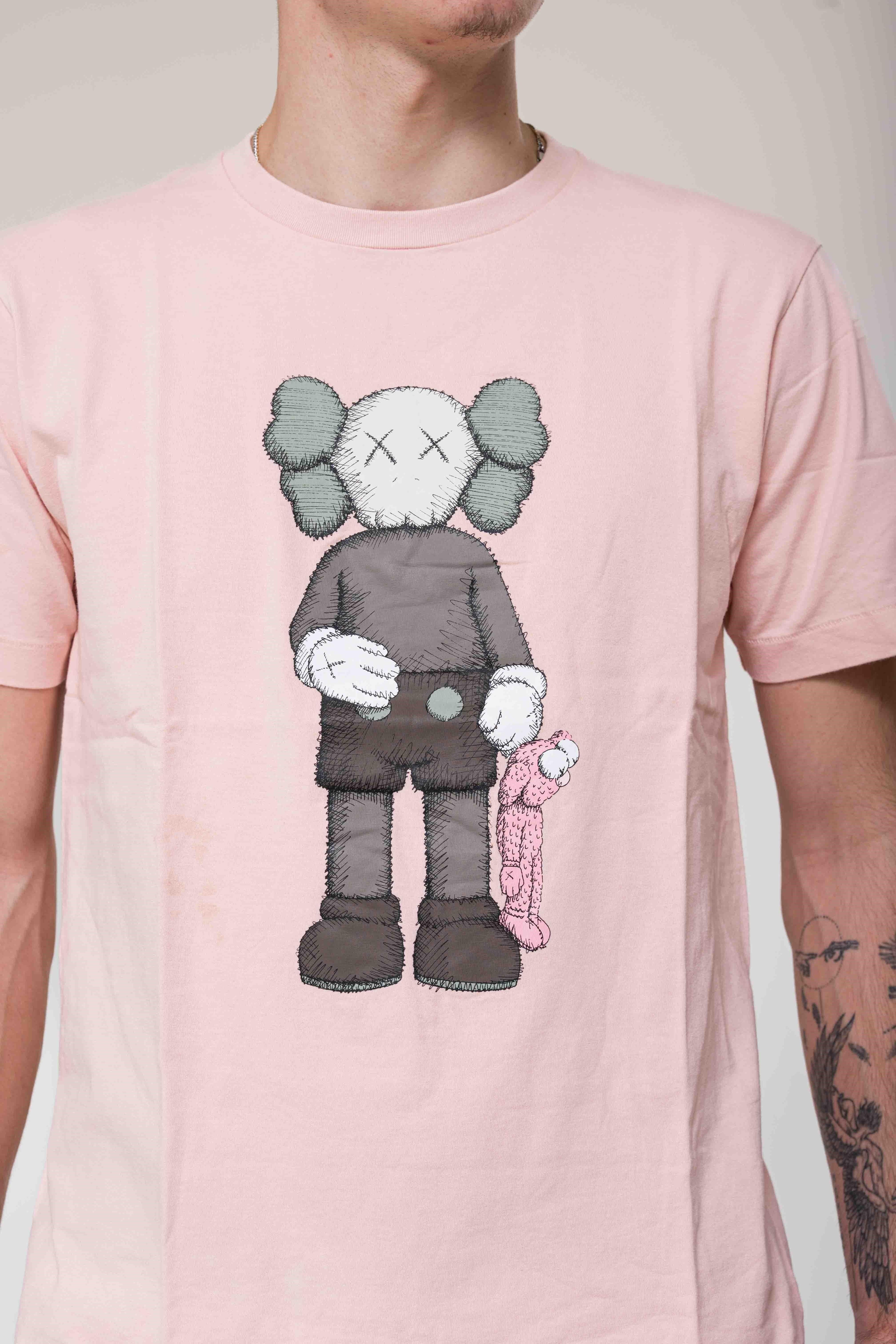 KAWS x Uniqlo Companion Tee Pink graphic detail