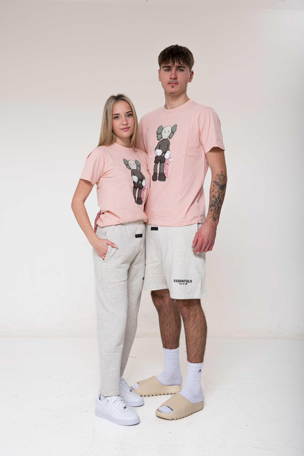 KAWS x Uniqlo Companion Tee Pink outfit