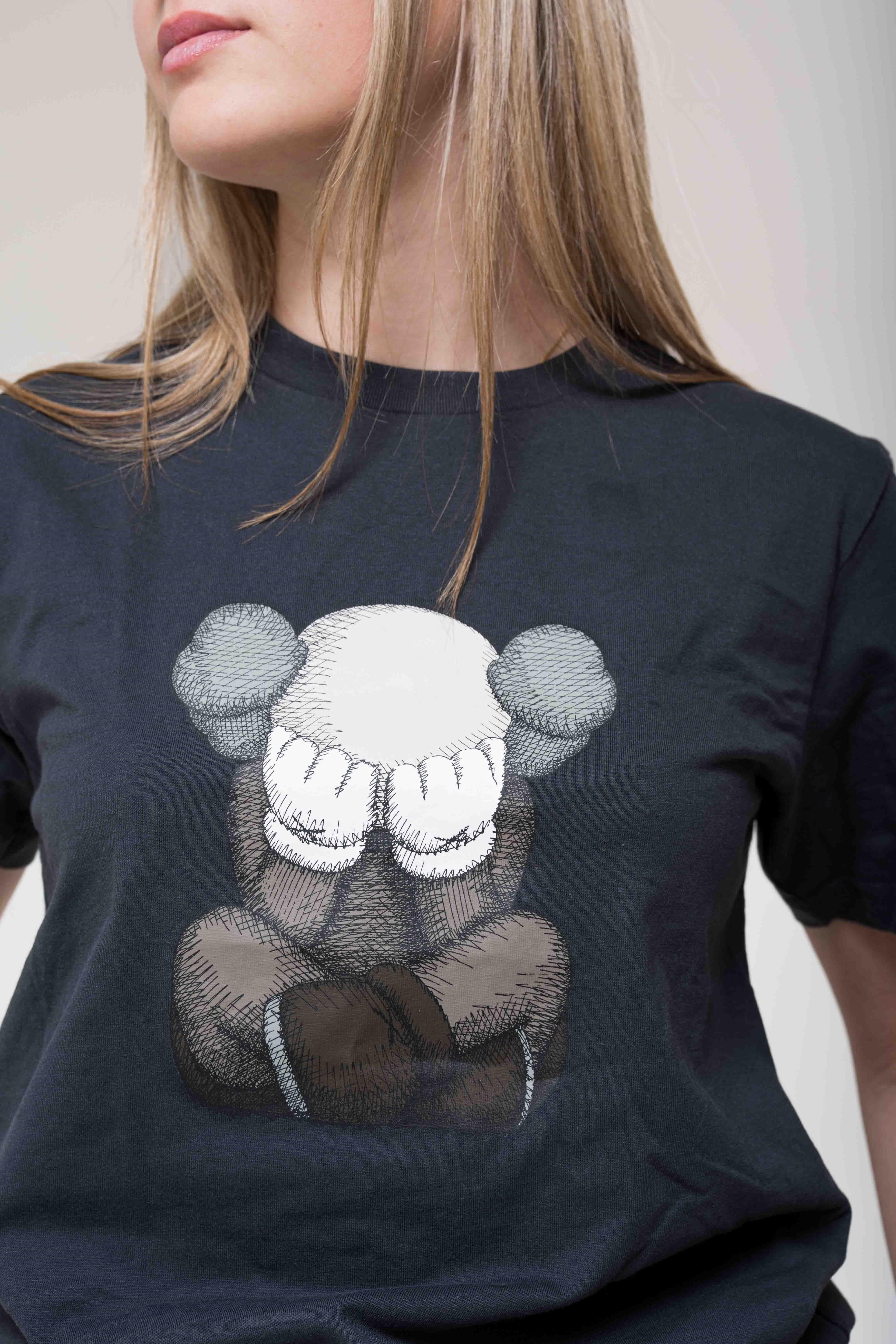 KAWS x Uniqlo Tokyo First Tee Dark Grey graphic detail