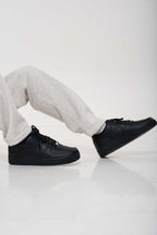 Nike Air Force 1 Low '07 Black on feet